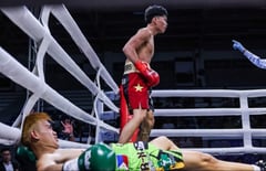 Paciones battles Dorona at Elorde