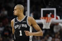 SAN ANTONIO, TX - JANUARY 17: Victor Wembanyama #1 of the San Antonio Spurs reacts after hitting a three against Minnesota Timberwolves in the first half at Frost Bank Center on January 17, 2026 in San Antonio, Texas.
