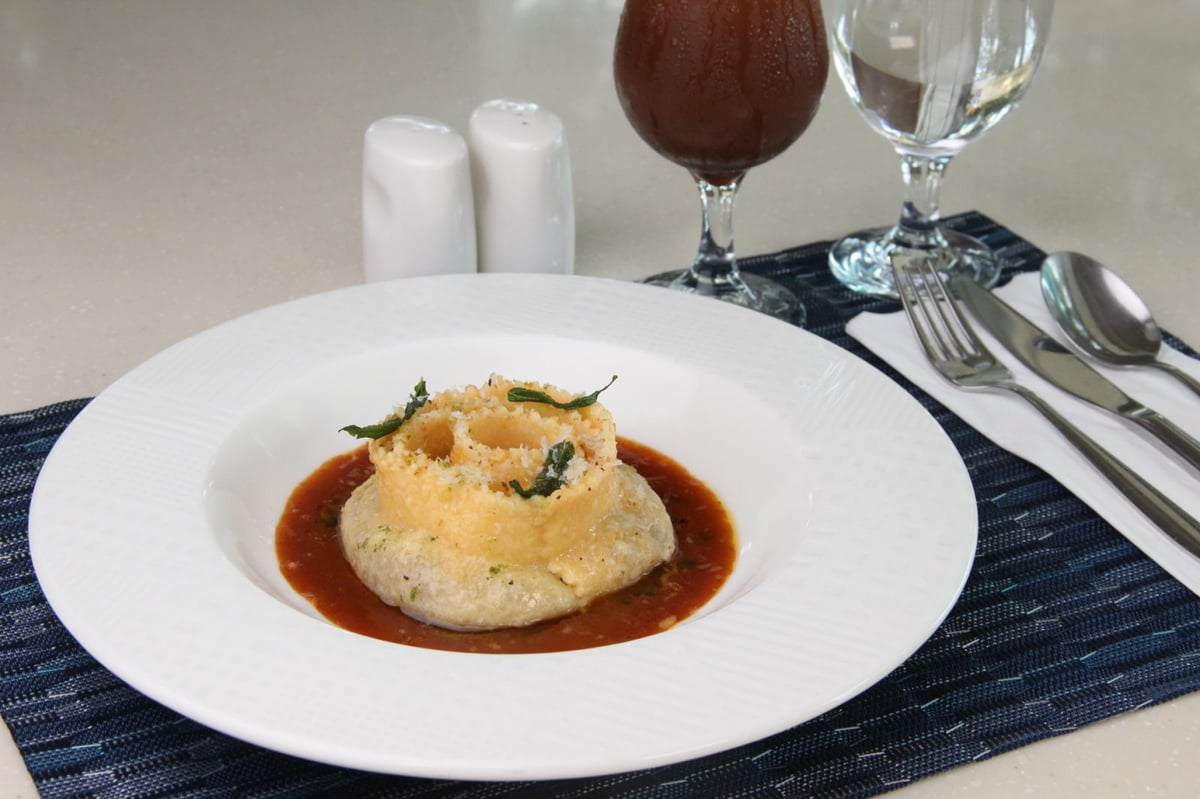 Oxtail Pappardelle Ripiene - Stuffed pasta with homemade ricotta and braised oxtail, and tomato puree
