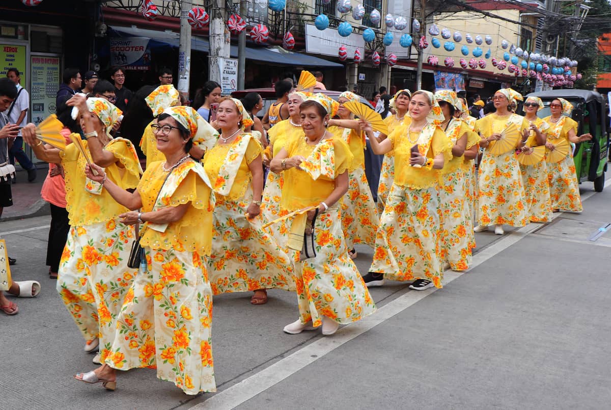 SENIOR ladies at the bisperas procession and buling-buling presentation.