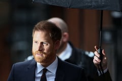 Prince Harry says tabloids made Meghan’s life ‘absolute misery’