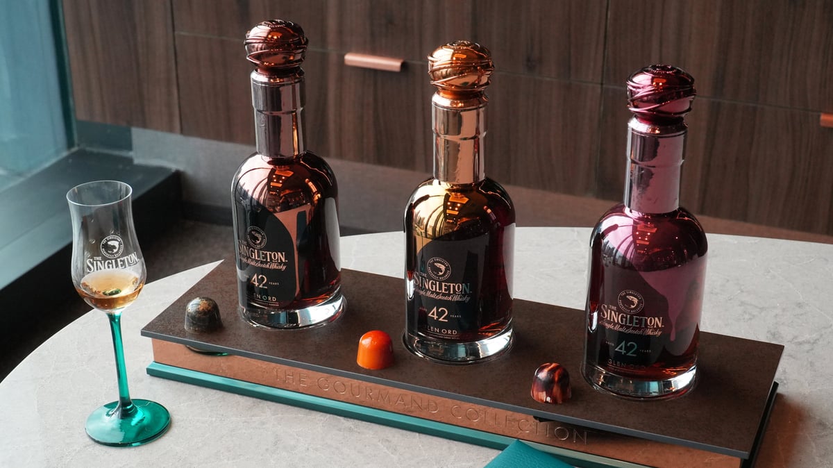 Whisky collector Patterson Ngo displays selections from his growing collection, including the 42-year-old Singleton Gourmand, one of only 136 bottles released worldwide.