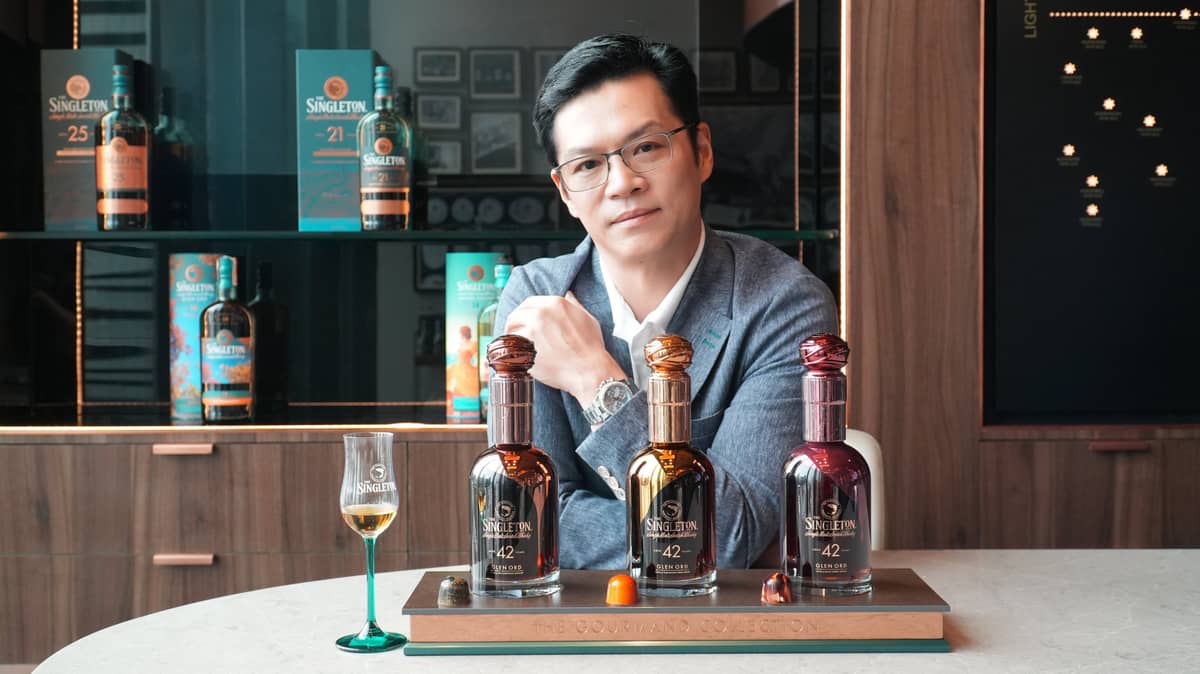 Whisky collector and hospitality entrepreneur Patterson Ngo poses with his bottles of the rare 42-year-old Singleton Gourmand, one of only 136 bottles released worldwide, recently acquired in the Philippines.