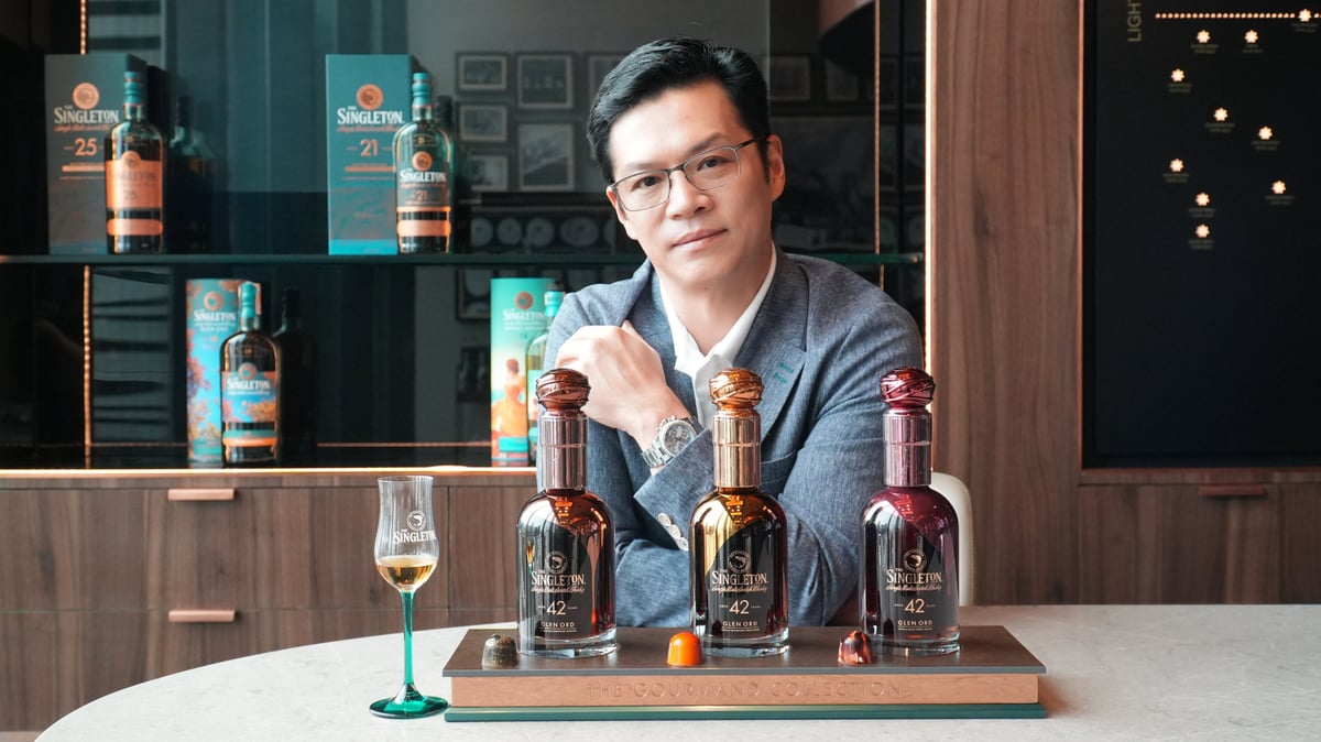 Whisky collector and hospitality entrepreneur Patterson Ngo poses with his bottles of the rare 42-year-old Singleton Gourmand, one of only 136 bottles released worldwide, recently acquired in the Philippines.