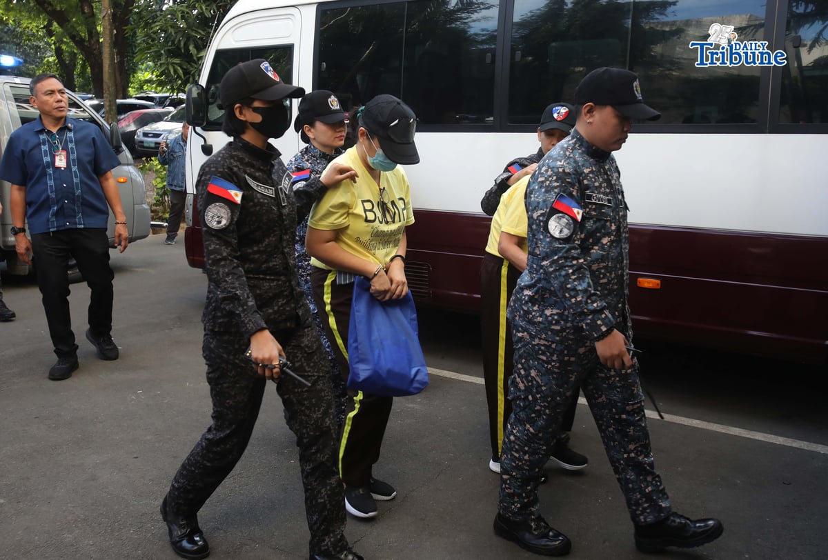 (January 22 2026) Two of the nine Former Department of Public Works and Highways-MIMAROPA officials involved in an anomalous flood control project in Naujan, Oriental Mindoro, arrive at the Sandiganbayan  in Quezon City on Thursday January 22, 2026, to asked formally to grant their petition for bail. A Land Bank of the Philippines EDSA–NIA branch official is expected to testify at the bail hearing of DPWH–MIMAROPA officials charged alongside former congressman Zaldy Co in a malversation case linked to a road dike project in Mindoro. Photo/Analy Labor