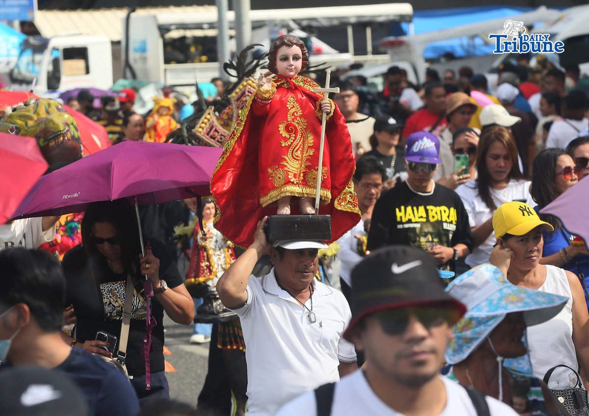 Devotees carry their own images of the Santo Niño as they join the fluvial and solemn foot procession of the Santo Niño de Cebu at Muelle Loney in Iloilo City on Friday, January 23, as part of the Feast of the Santo Niño and the 2026 Dinagyang Festival. Hundreds of faithful walked in prayer and thanksgiving as the revered image was escorted from the waterfront amid hymns, marking one of the festival’s most significant religious rites.