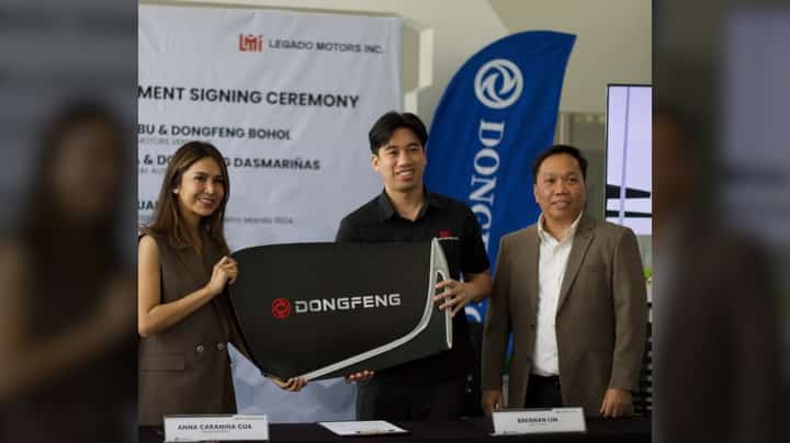 DONGFENG executives and their dealer partner pose during a signing ceremony that confirms new locations in Manila, Dasmariñas, Cebu, and Bohol as part of the brand’s 2026 expansion plans. Shown are (from left): Anna Caranenina Cua, Central Auto Resources; Brennan Lim, deputy CEO, Legado Motors Inc. and Giovanni Frias, vice president of Operations, LMI.