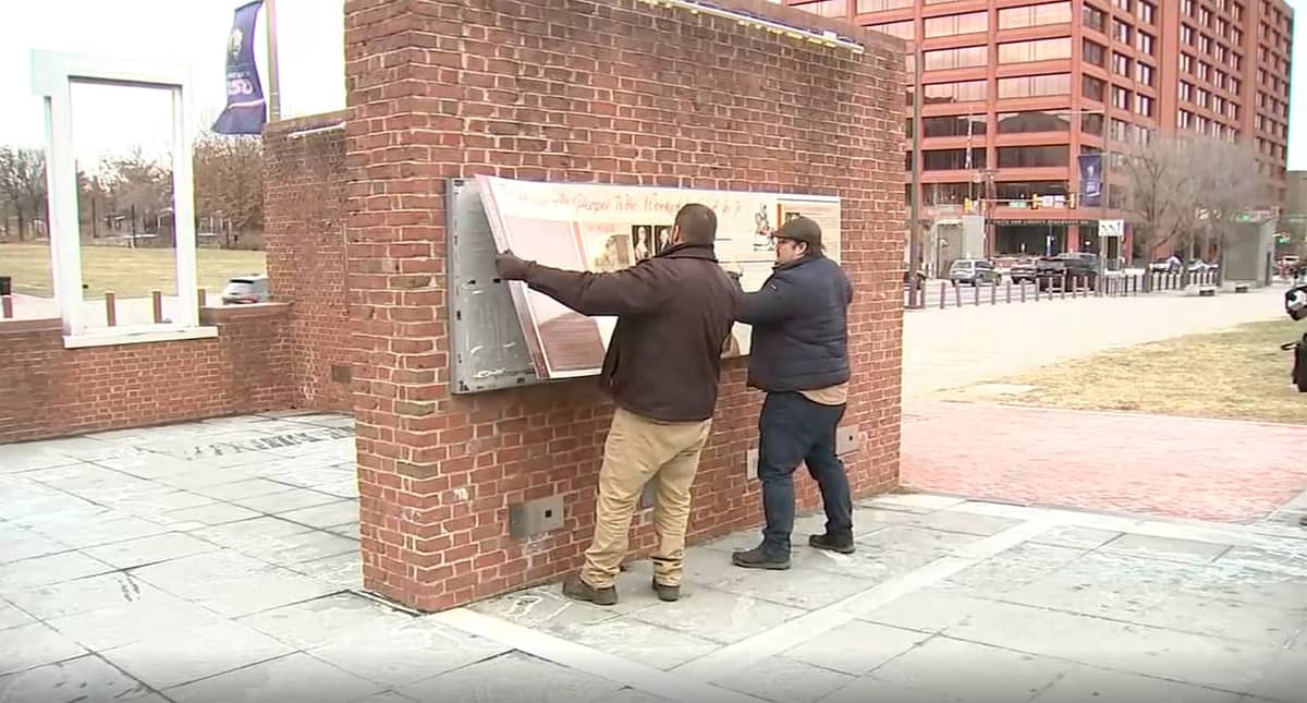 National Park Service staff remove panels from the "Freedom and Slavery in the Making of a New Nation" exhibit at the President's House in Philadelphia.