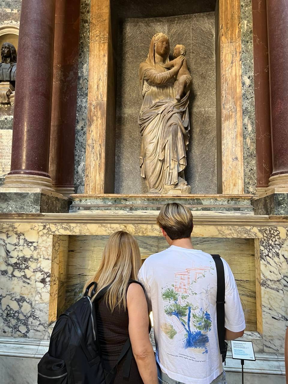 A COUPLE admires the Madonna del Sasso (Madonna of the Stone).