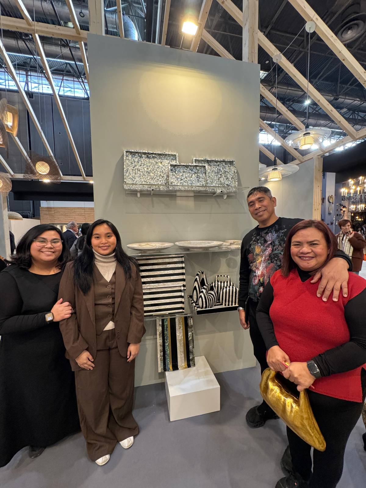 ROSEMARIE and Melecio Oamil with daughters. (Art pieces by Melecio).