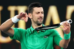Short, sweet victory: Djokovic makes quarters via walkover