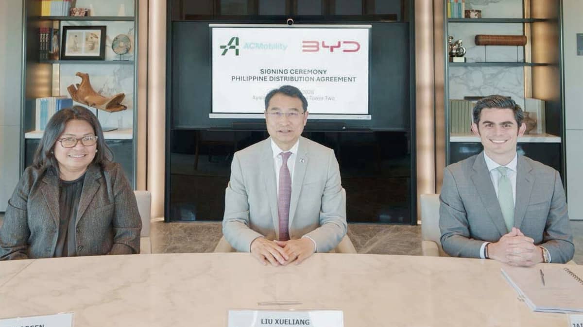BYD Cars Philippines renews its distributorship with ACMobility led by (from left) Sharyn Jacobsen, chief finance officer, ACMobility; Liu Xueliang, general manager, BYD Asia-Pacific Auto Sales Division; and Jaime Alfonso Zobel de Ayala, chief executive officer, ACMobility.