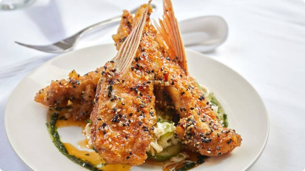 THE wildly popular Tempura Fin Wings (prepared in Korean dressing) are a unique cut of fish, designed so guests can “pick them up and eat them like a chicken wing,” according to Chef Michael Nelson.