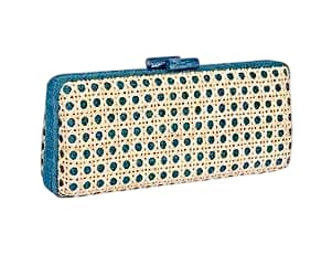 THE ALESSANDRA long clutch is crafted from ocean blue raffia with rattan ‘solihiya’ caning weave overlay and finished with Kabibe shell inlay clasps. It features a drop-in gold chain shoulder strap, allowing your hands to be free to take selfies and sip a drink. It’s the perfect clutch to wear if you’re going somewhere warm and sunny. Measures 9.25”L x 1.75”W x 4.5”H. Inspiration: ‘With its solihiya rattan weave, the Alessandra clutch channels the refined craftsmanship of classic caned furniture. It’s a small accessory with a big story, marrying tactile nostalgia with modern, polished sophistication.’
