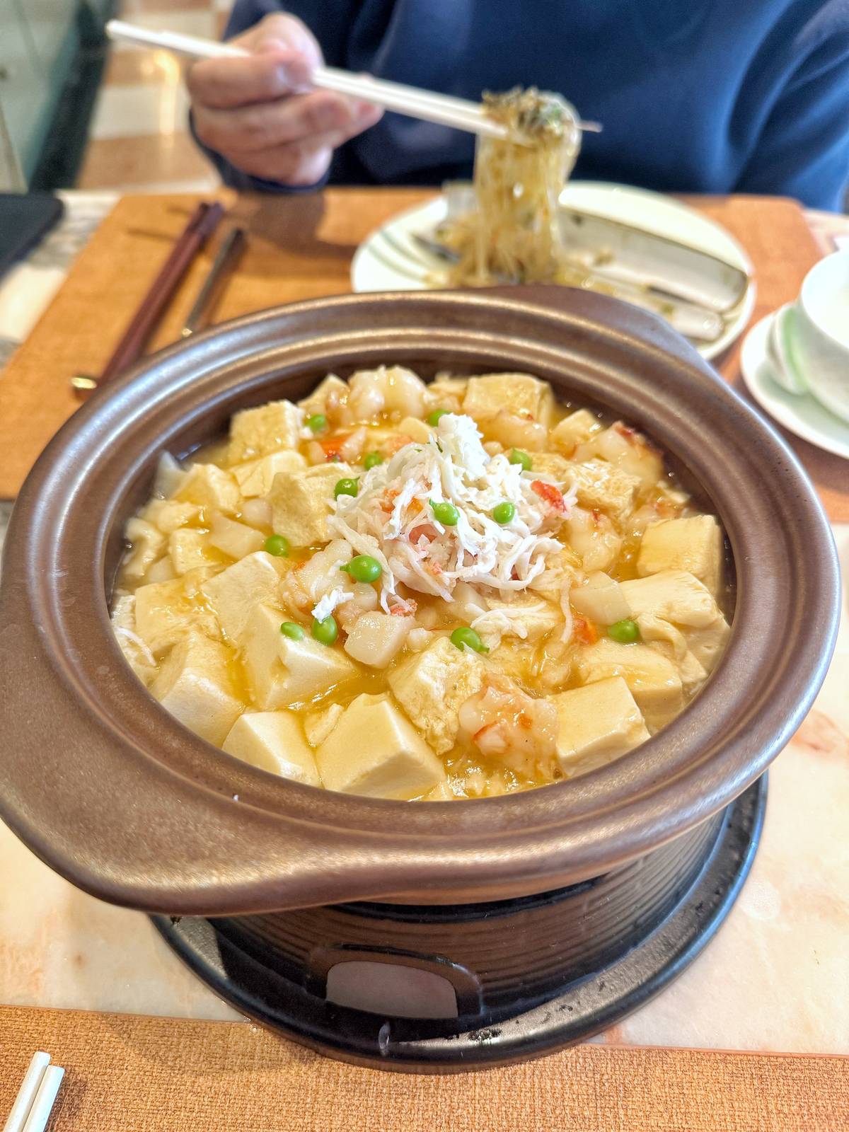 BRAISED tofu with king crab meat, tiger prawn and scallop.