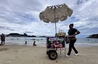 A STREET vendor sells acai berry juice at Copacabana beach in Rio de Janeiro, Brazil on 24 January 2026.
