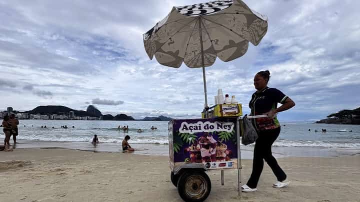 A STREET vendor sells acai berry juice at Copacabana beach in Rio de Janeiro, Brazil on 24 January 2026.