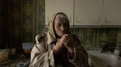 Kyiv’s elderly shiver after Russian attacks on power, heat