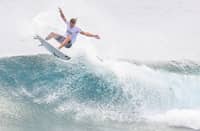 WHERE waves write their own invitations A surfer rides the curling crest off Siargao’s coast, poised between sky and sea — a fitting emblem of journeys made lighter, as lower airfares carry more dreamers toward the island.