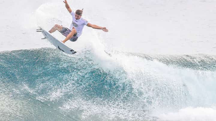 WHERE waves write their own invitations A surfer rides the curling crest off Siargao’s coast, poised between sky and sea — a fitting emblem of journeys made lighter, as lower airfares carry more dreamers toward the island.