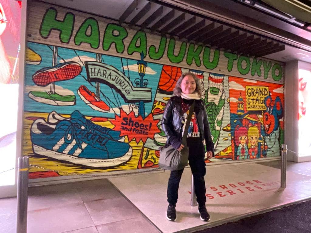 ME wearing Puma Softride and Evangelion shirt in front ABC-Mart in Tokyo’s fashion capital Harajuku.