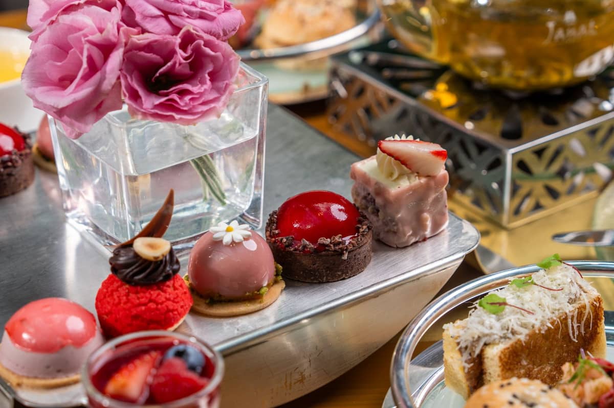Sweets include cheese red velvet cake, mixed berry pistachio sphere, cherry chocolate tart, raspberry mousse, vanila panna cotta with raspberyy sauce and fresh berries, hazelnut choux with chocolate ganache.