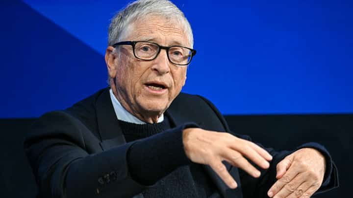 Microsoft co-founder and US philanthropist Bill Gates gestures as he speaks during the World Economic Forum (WEF) annual meeting in Davos on January 21, 2026. The World Economic Forum takes place in Davos from January 19 to January 23, 2026.