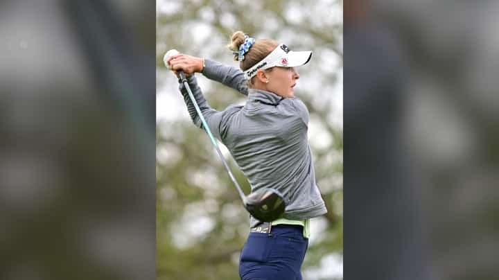 Korda defies brutal conditions, grabs lead