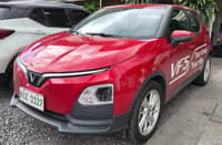 RED VinFast VF5 is shown during a local event as the brand outlines its battery subscription option that lowers upfront ownership costs.