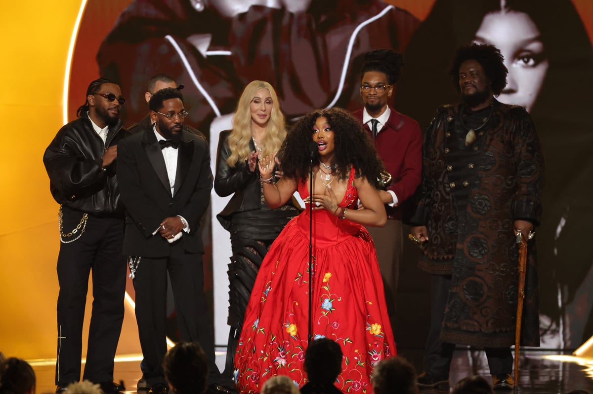 KENDRICK Lamar and SZA accept the Record of the Year award for 'lunter.'