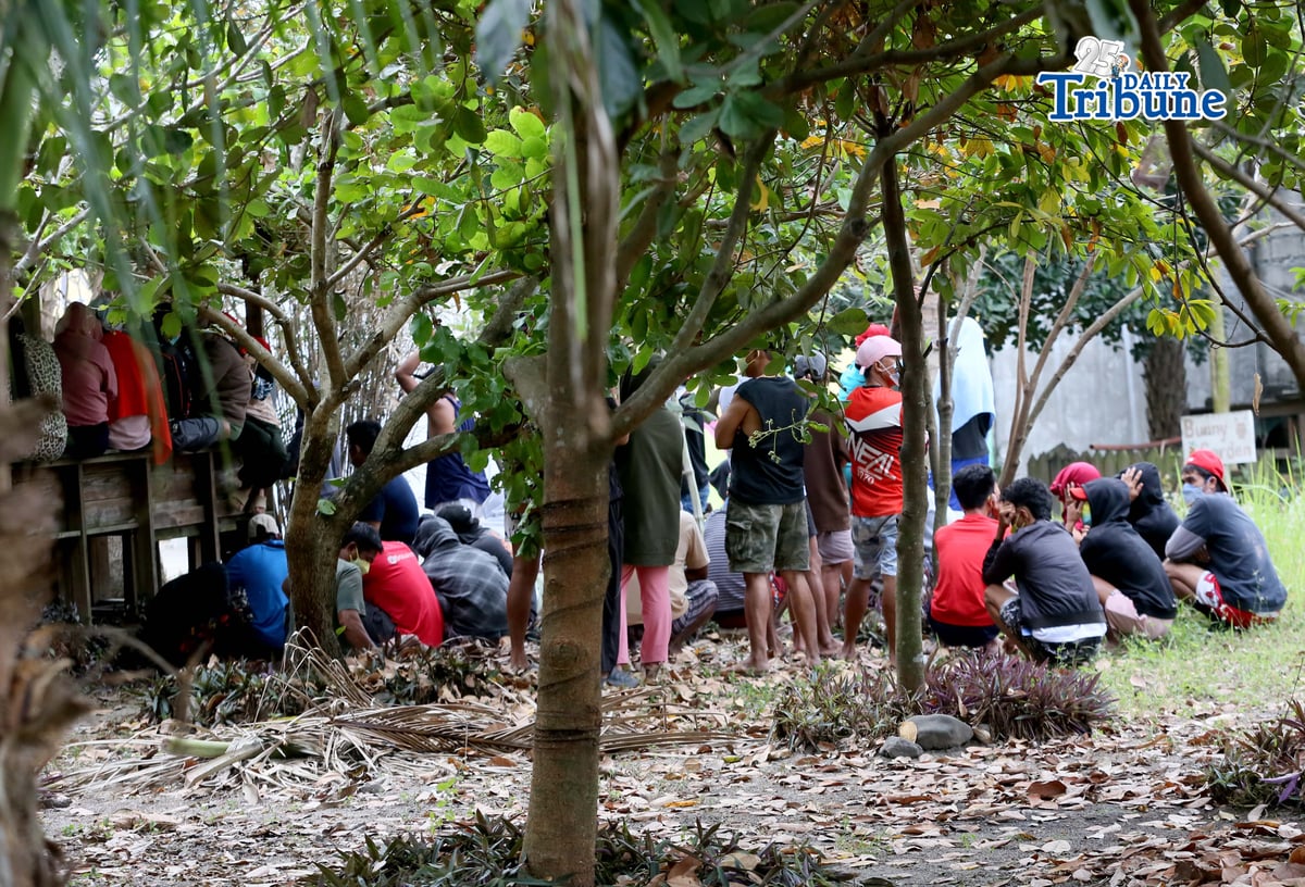 (February 05 2026) The 65 Filipino 54 men and 11 women rescued at the illegal factory in Pampanga, during the Joint operation of the Philippine National Police (PNP) and the Bureau of Customs (BOC). Sec. Remulla said the rescued Pinoy they force to work inhumane conditions, they leave at the barracks were set up at a grassy area of the lot and were made only of wooden planks and corrugated metal roof sheets, no windows no electric fan theres only one light they’re only sleeping on makeshift beds. Photo/Analy Labor