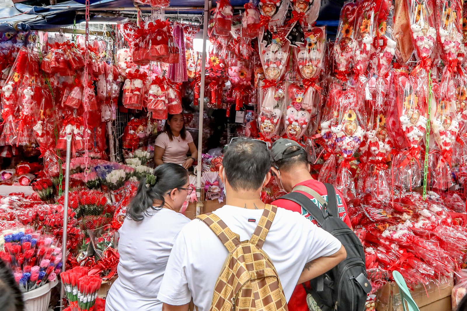 Divisoria bleeds red this season as various gifts for valentines, including heart shaped greetings, stuffed toys, chocolates, and flowers, are seen sold in retail and bulk.| Aram Lascano