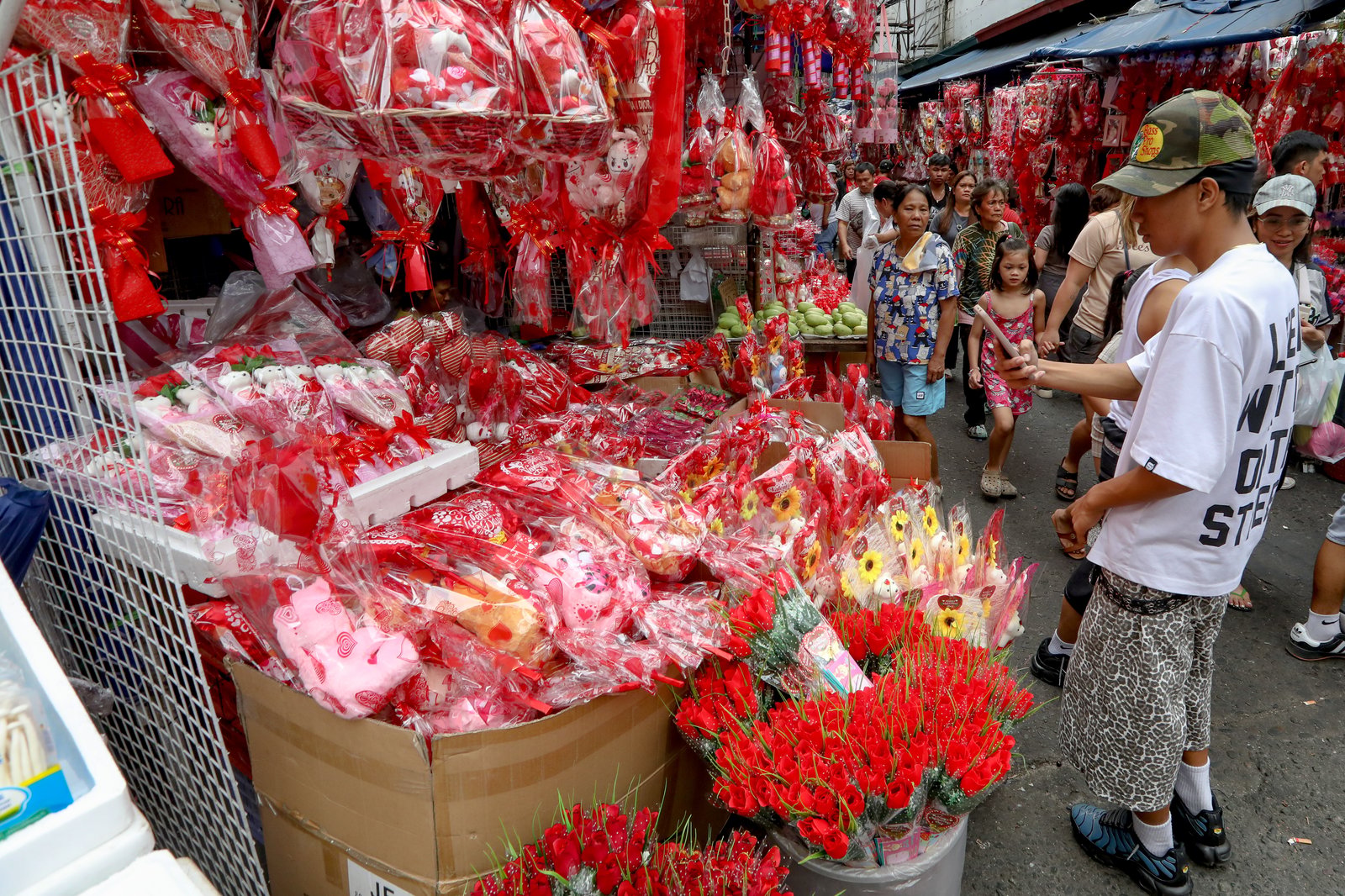 Divisoria bleeds red this season as various gifts for valentines, including heart shaped greetings, stuffed toys, chocolates, and flowers, are seen sold in retail and bulk.| Aram Lascano