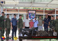 Two NPA members surrender in Camarines Norte, turn over firearms, IED