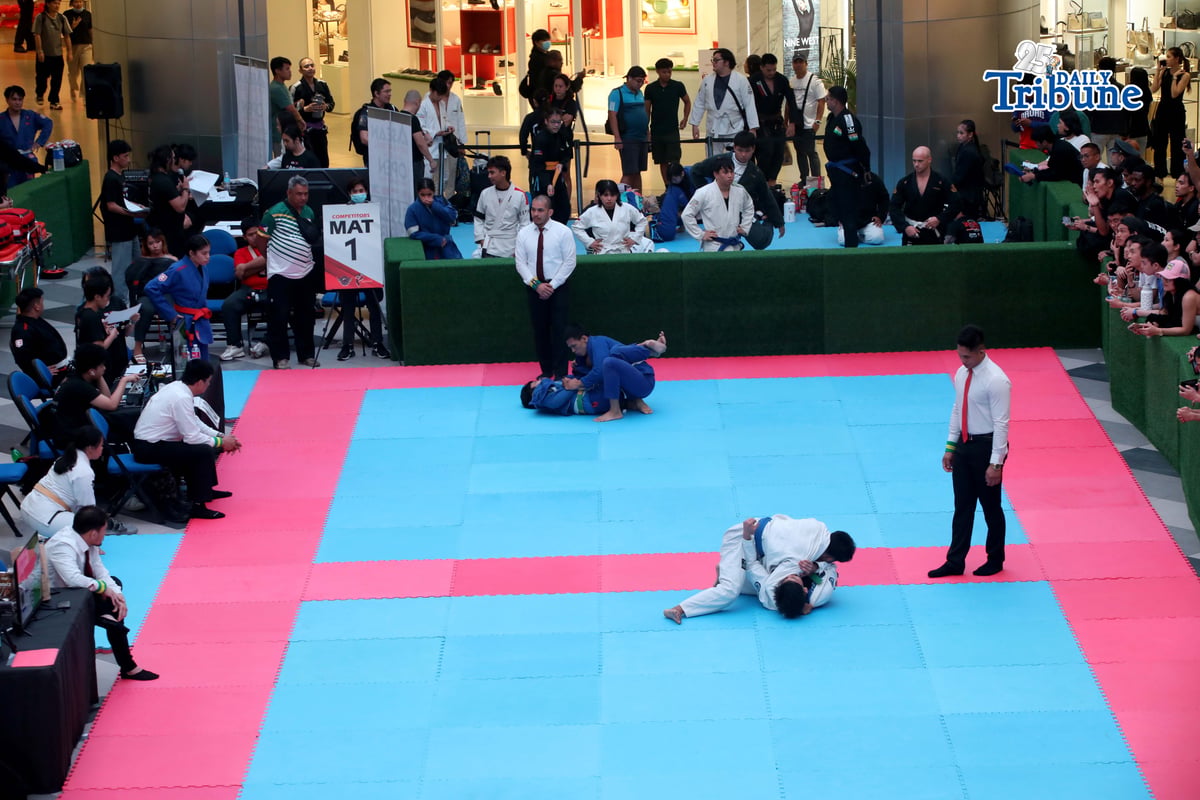 Fighters from various teams compete for victory during the ASEAN International Jiu-Jitsu Open Championship 2026, held at a mall in Araneta City, Quezon City, on Saturday.