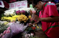 Workers rush to make bouquets of flowers for sale at a flower shop in Araneta City, Cubao, Quezon City, on Saturday, 7 February 2026, just days before the Valentine’s Day celebration.