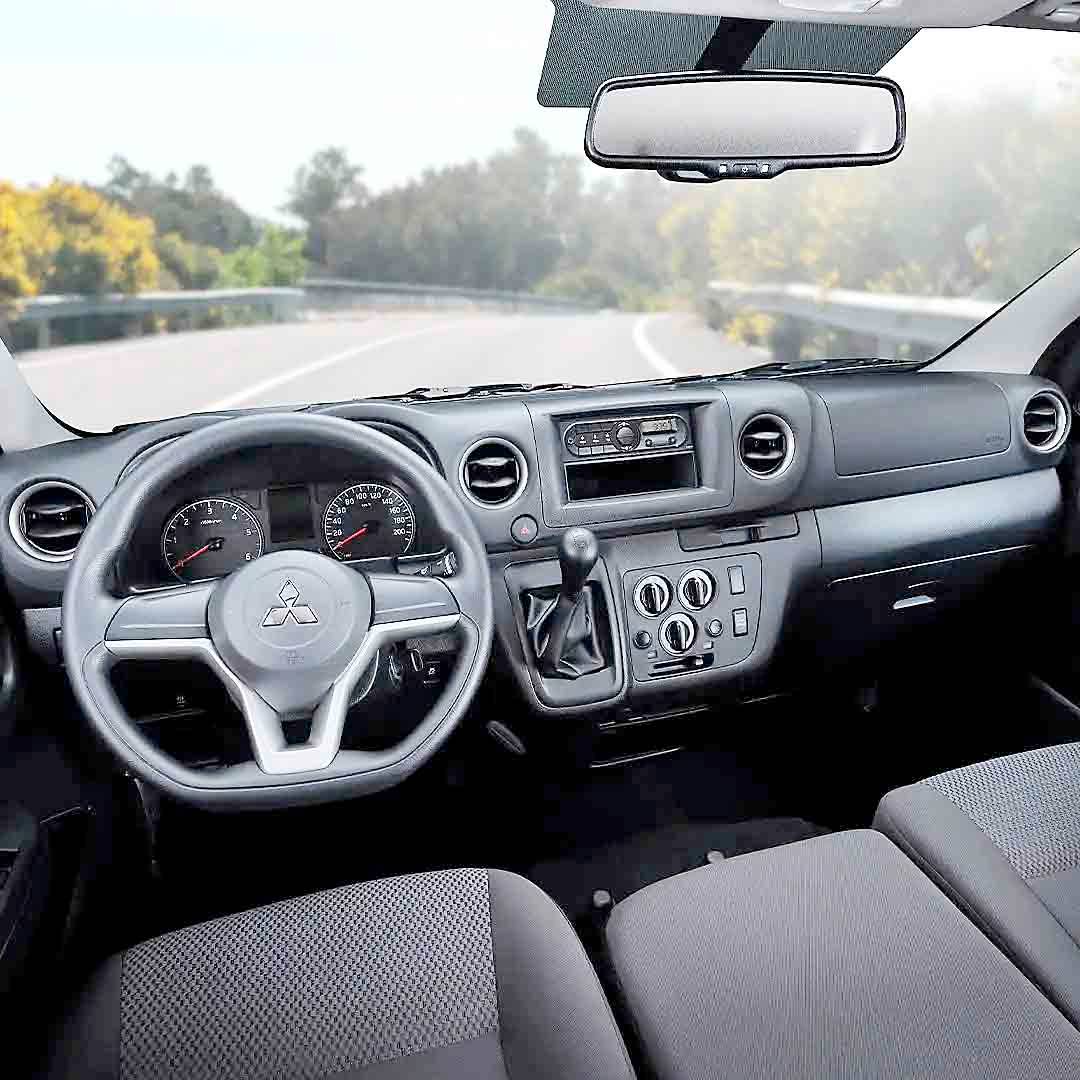 INSIDE the Versa Van, the driver’s layout stays simple with controls arranged for routine service and shuttle use.