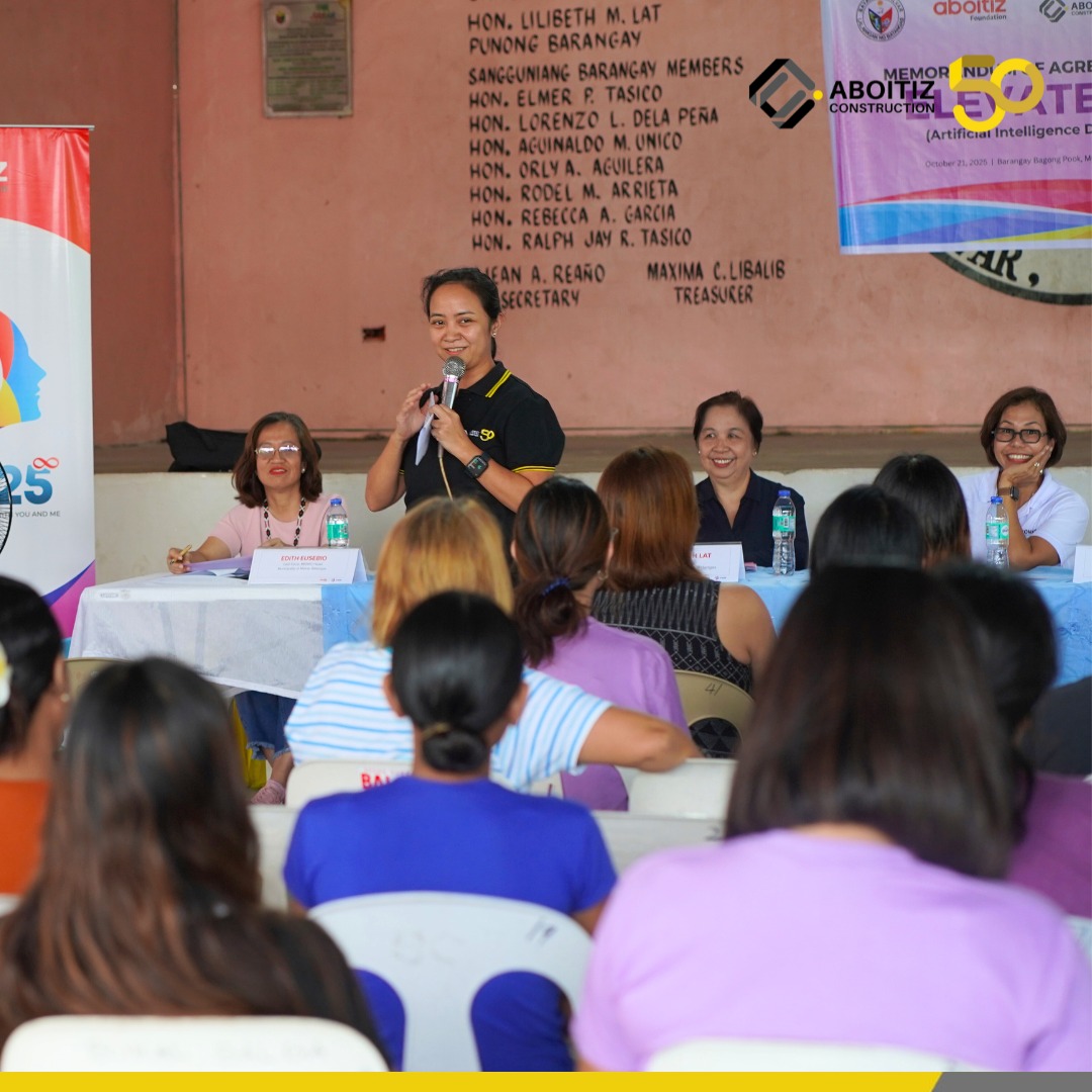 KARMINE Andrea Ching (standing), senior assistant vice president for business transformation of Aboitiz Construction, speaks to women from Batangas during Aboitiz Foundation’s Elevate AIDA training at the Malvar Municipal Hall.
