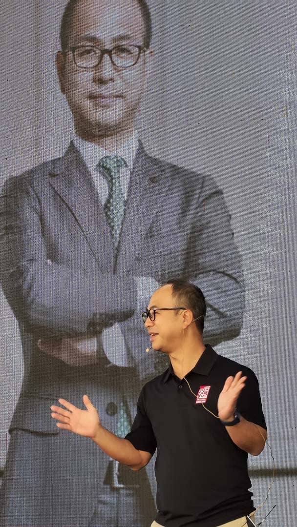 MASAO Tsutsumi, president of Nissan Philippines Inc., speaks to car club members and guests during the Nissan Festival program.