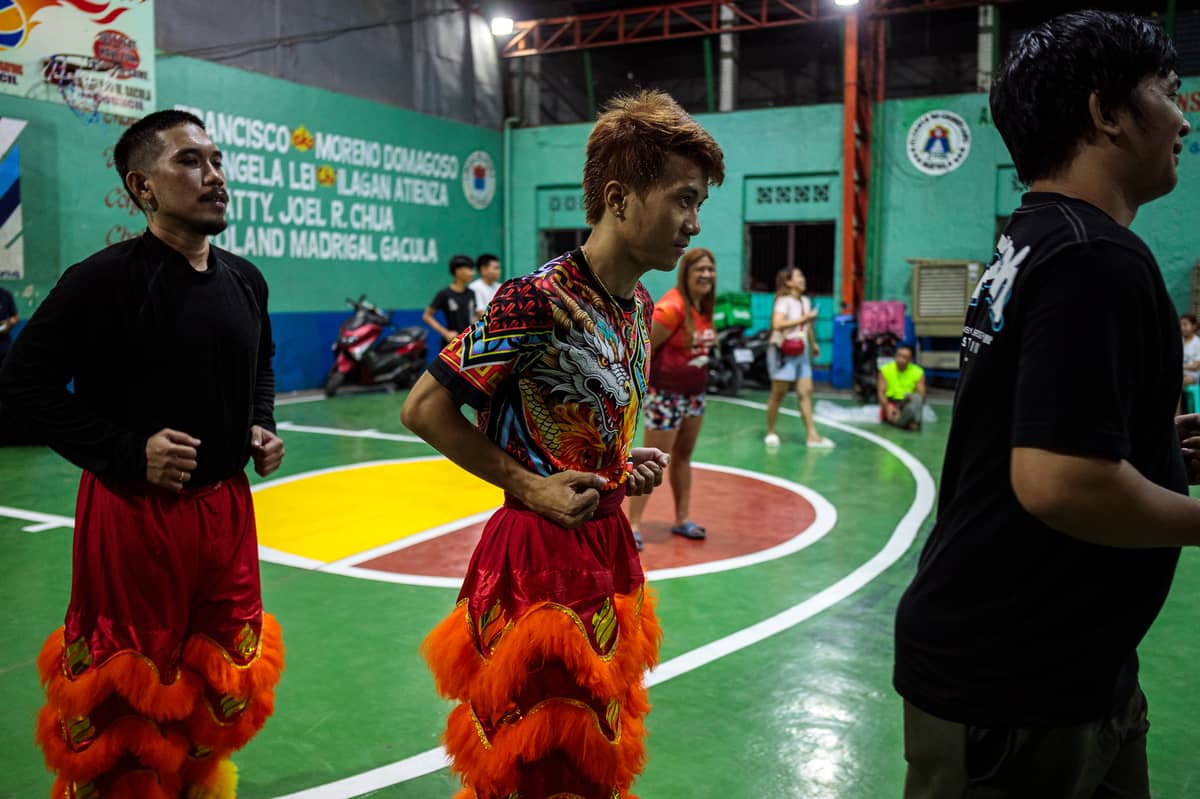 The Philippine Rui Dragon Dance group rehearses for an upcoming lion dance competition.