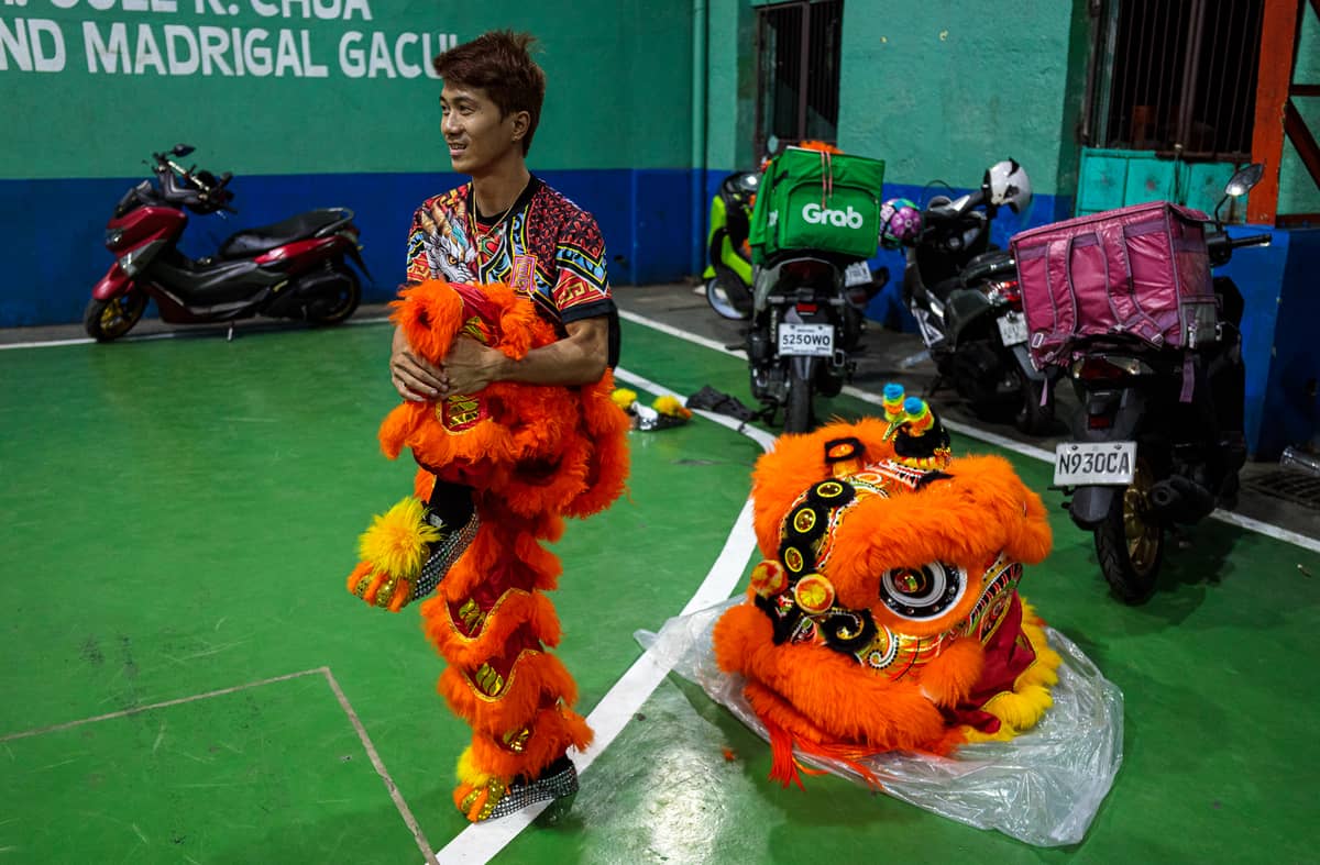 Jhayvee Sicat warms up ahead of practice for an upcoming lion dance competition in Manila on Friday, 6 February 2026. Sicat and his team are vying to repeat their championship run in celebration of the Chinese New Year.