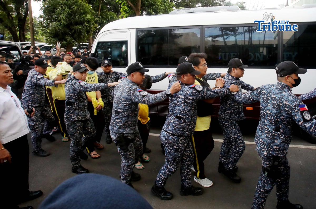 Bureau of Jail Management and Penology (BJMP) personnel heavily guarded former Senator Ramon “Bong” Revilla Jr., along with 15 co-accused, as they arrived at the Sandiganbayan in Quezon City on Monday, February 9, 2026, to attend the hearing on their malversation and graft cases over alleged anomalous flood control projects. Photo/Analy Labor