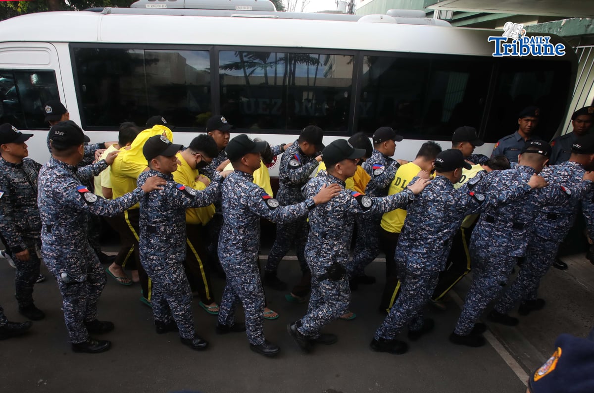 Bureau of Jail Management and Penology (BJMP) personnel heavily guarded former Senator Ramon “Bong” Revilla Jr., along with 15 co-accused, as they arrived at the Sandiganbayan in Quezon City on Monday, February 9, 2026, to attend the hearing on their malversation and graft cases over alleged anomalous flood control projects. Photo/Analy Labor