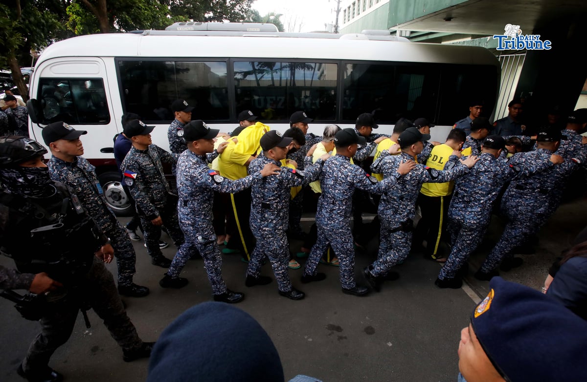 Bureau of Jail Management and Penology (BJMP) personnel heavily guarded former Senator Ramon “Bong” Revilla Jr., along with 15 co-accused, as they arrived at the Sandiganbayan in Quezon City on Monday, February 9, 2026, to attend the hearing on their malversation and graft cases over alleged anomalous flood control projects. Photo/Analy Labor