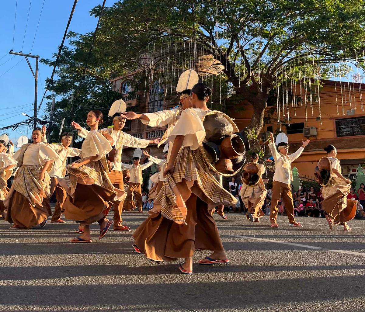 A STREET-DANCE contingent in costumes interpreted from local culture and tradition.
