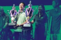 RONIN Leviste receives the trophy after he and his guest partner, Darren Flores, emerged as the lowest net champion in the 38th Mango Tee. The Alabang Country Club Inc. board of directors eventually withdrew his award due to their ‘highly unusual and statistically improbable’ scores.