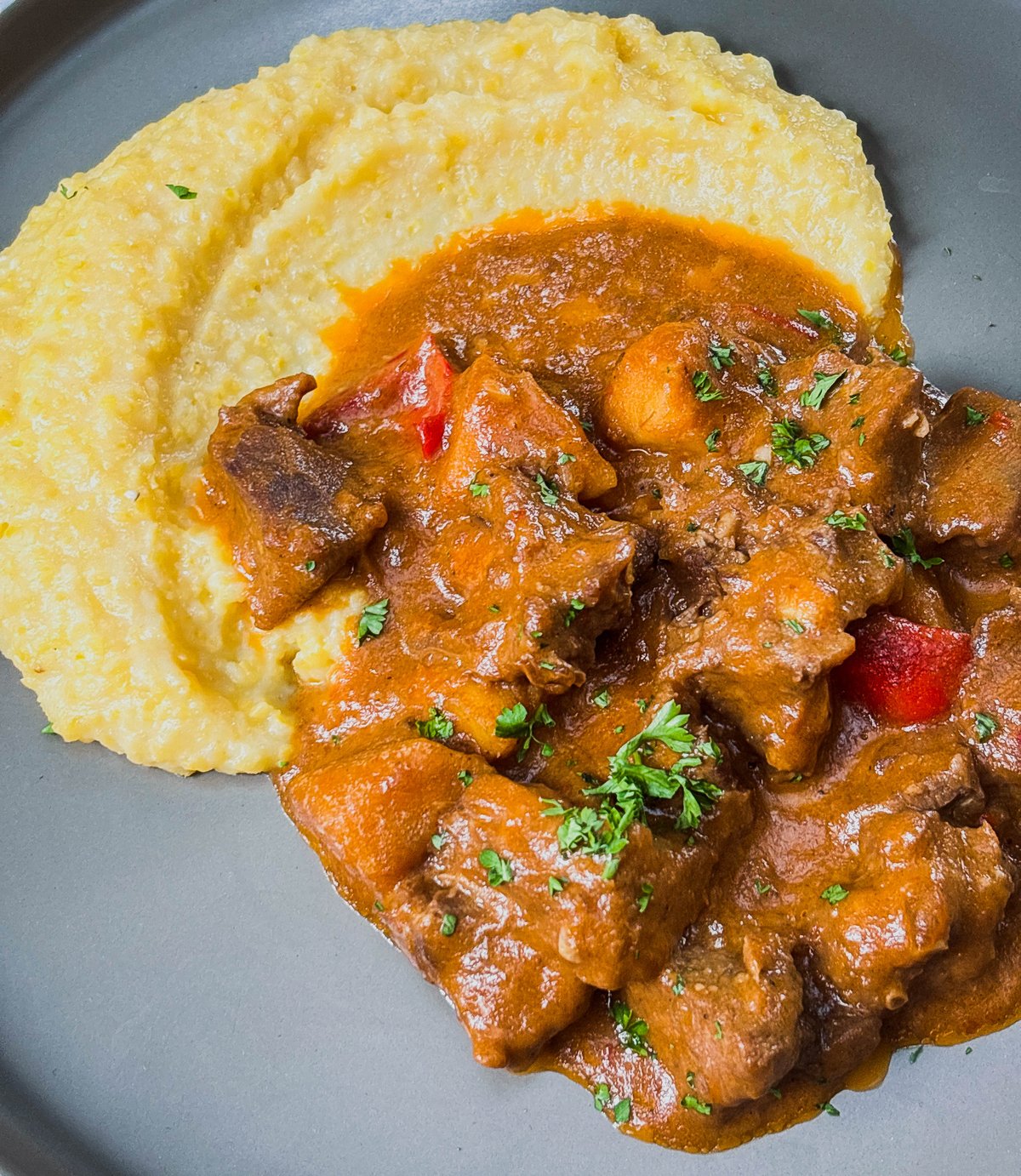Gorio’s Roadside Restaurant's Cavite Style Lamb Caldereta served with polenta