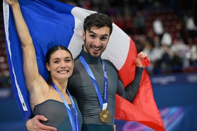 French ice dancers edge U.S. duo, spark backlash
