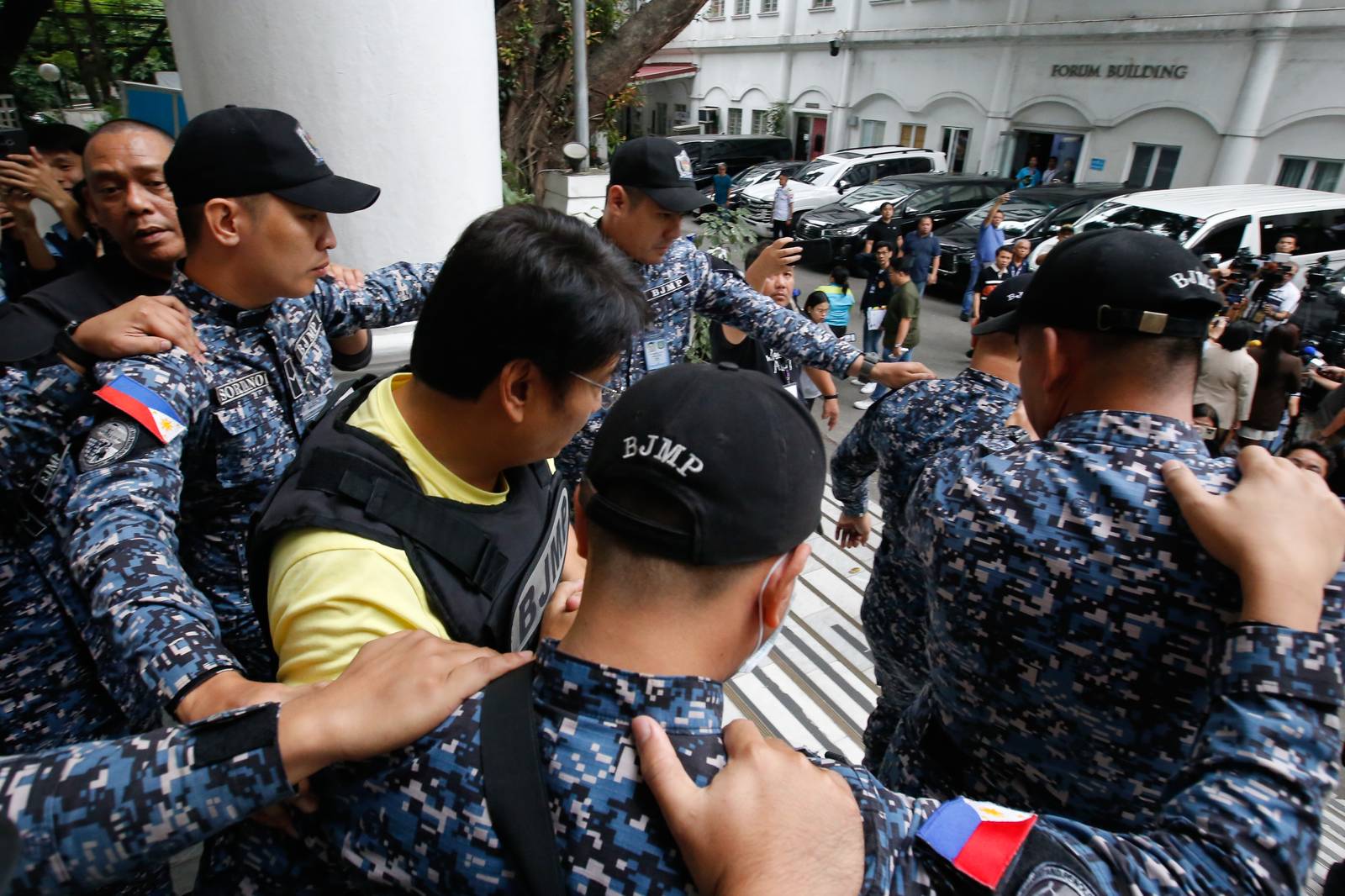 Former Senator Ramon Bong Revilla Jr. leaves the Department of Justice in Manila on Thursday, 12 February 2026, following a preliminary probe into plunder allegations involving anomalous flood control projects.