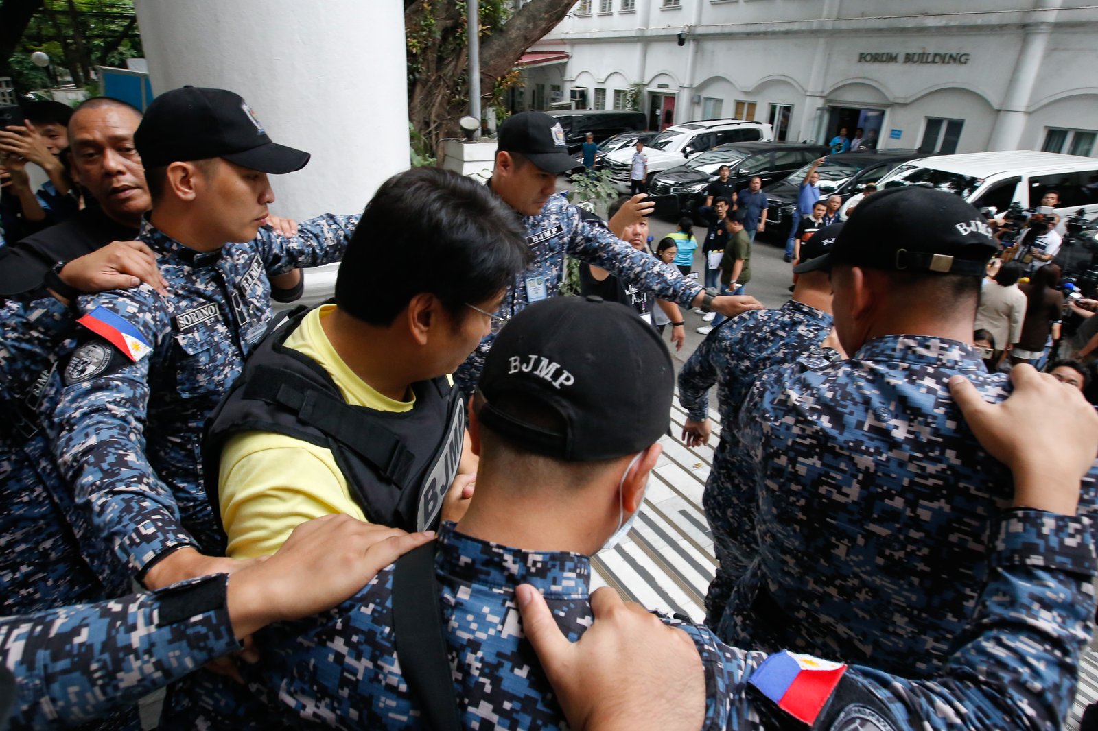 Former Senator Ramon Bong Revilla Jr. leaves the Department of Justice in Manila on Thursday, 12 February 2026, following a preliminary probe into plunder allegations involving anomalous flood control projects.